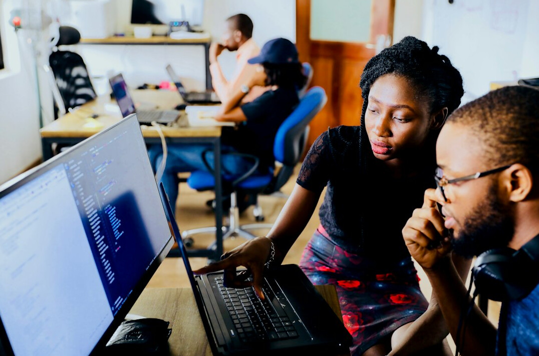 diverse group learning coding together